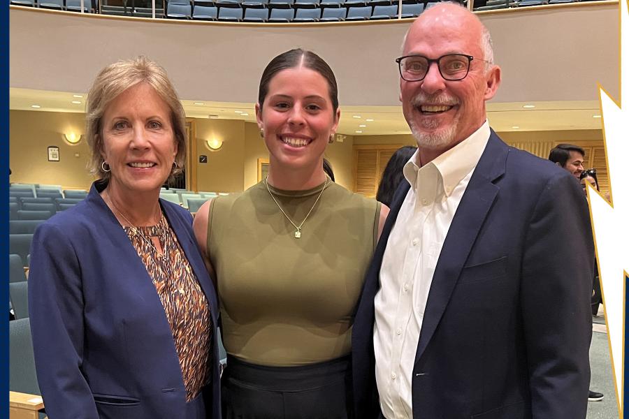 Kent State junior Sydney Davis, a marketing and finance major, is pictured with Kent State business alums Angelo and Joyce Kinicki.
