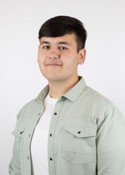 Asadbek Masharipov getting a photo taken. 