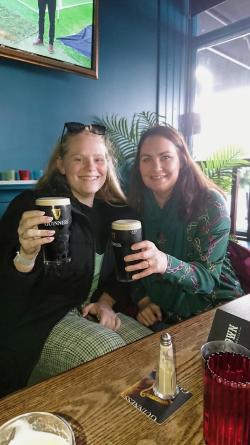 EHHS student Kari at an Irish pub with one of her friends.