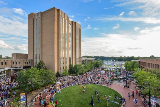 Aerial view of the Risman Plaza, including the KSU Library and several students walking the Esplanade