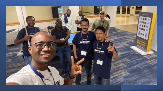A group of Fulbright scholars posing for a photo on the Kent campus.