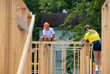 Students building houses