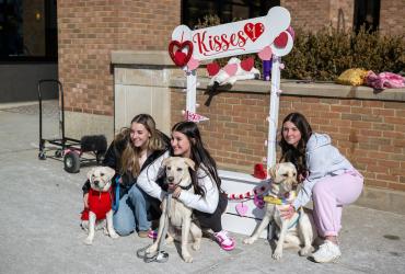 Collar Scholars puppy kissing booth 2026.