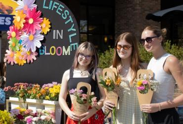 2026 Earth Fest Lifestyle in Bloom flowers and students