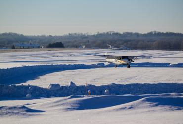 A snowy flight over the Kent State University Airport.