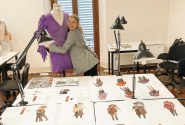Phoebe hugging a model