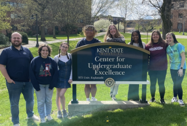 Ella with a group outside the Center for Undergraduate Excellence