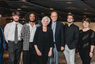photo of John and Fonda Elliot with student fellows.
