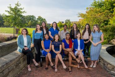 Photo of Homecoming Court students smiling and looking at the camera.