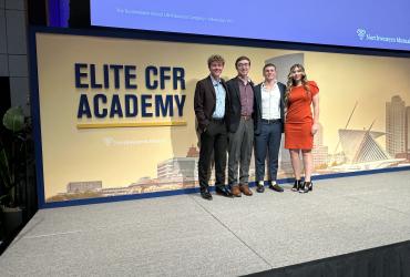 Josh Bordonaro on stage with fellow interns