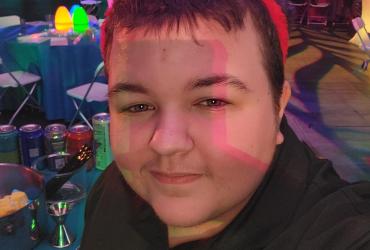 Logan Sanders working an on-campus event