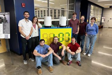 Nicholas Baird with a group of engineering students