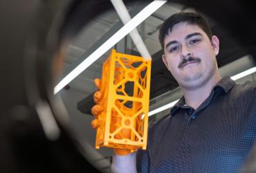 Mark Stallone is working in Kent State's Spacecraft Design Lab to build a satellite that may one day go to space.