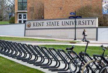 A Kent State University student makes her way across the Kent Campus. (Photo credit: Bob Christy)