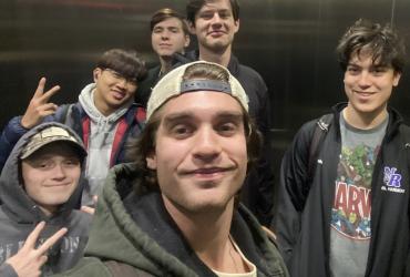 Jon Evanick takes a selfie with members of his residence hall.