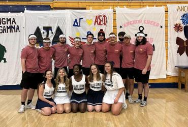 Mason posing with Greek Life