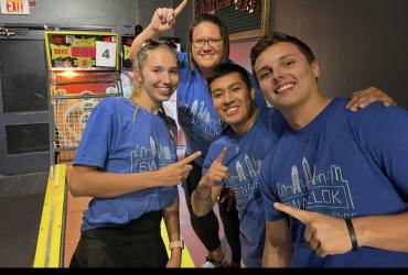 Tyler with group in Swagelok shirts