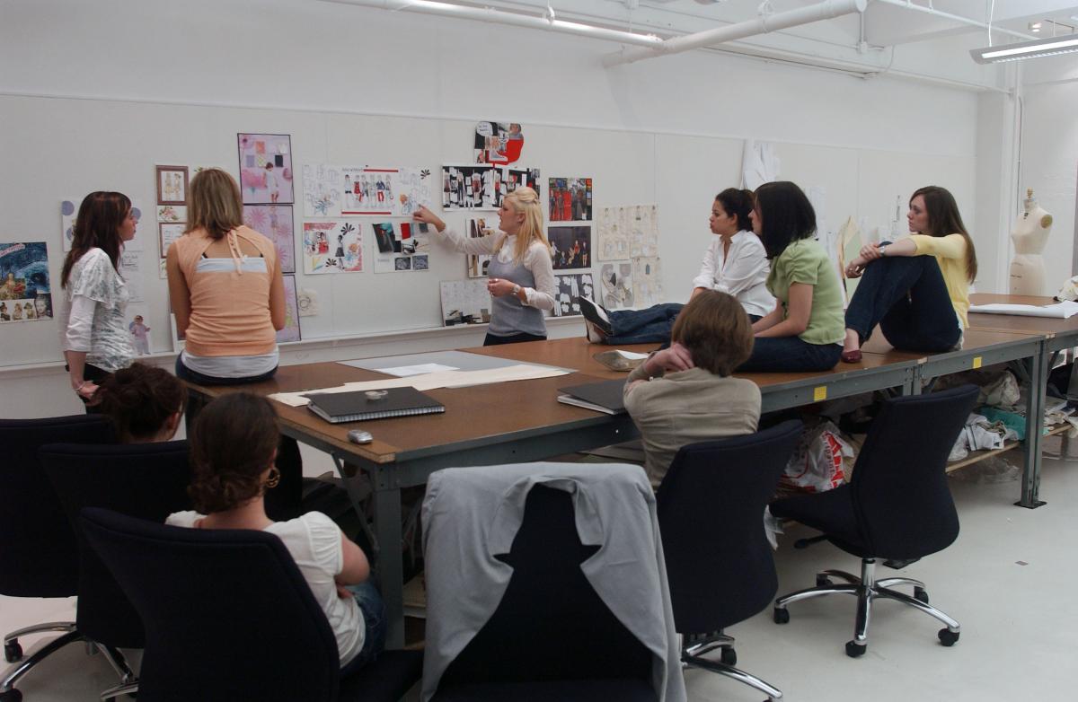 The first group of Kent State University students to study at the new New York City Fashion program listen to an instructor in April 2006.