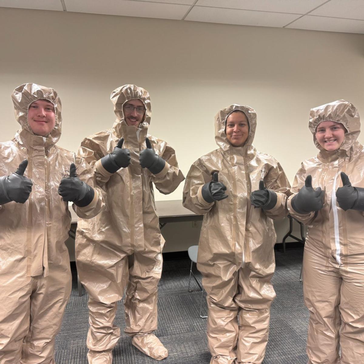 Nursing students at �������� at Trumbull in decontamination gear.