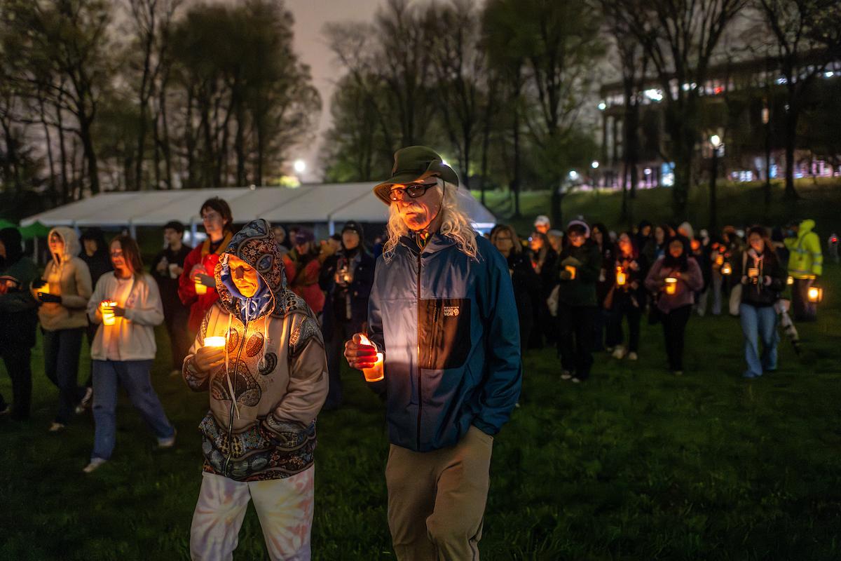 Members of the �Ը������� University community participate in the annual May 4 Candlelight Walk and Vigil in 2025. (Photo credit: Rami Daud, �Ը������� University)
