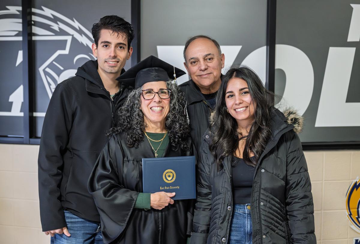 Linda Putaturo celebrates earning her bachelor's degree just days after her 60th birthday with her family of Kent State graduates.