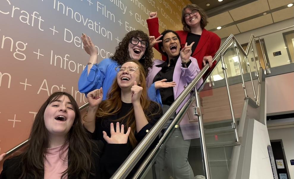 2026 Bateman Gold PRSSA Team showing personality on Franklin Hall lobby steps