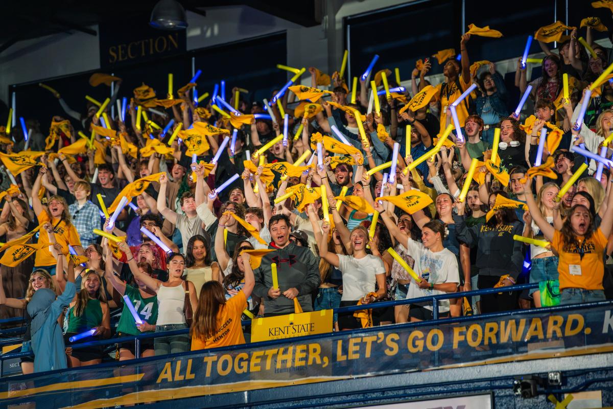New Kent State University students wave rally towels and cheer during 2026 Convocation. (Photo credit: Derek Galperin, Kent State University)