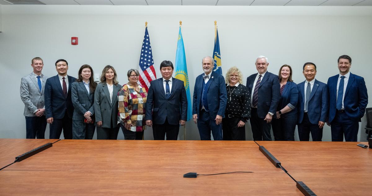 91���� officials at the signing of an agreement with the Civil Aviation Academy of Kazakhstan for a joint aviation program.