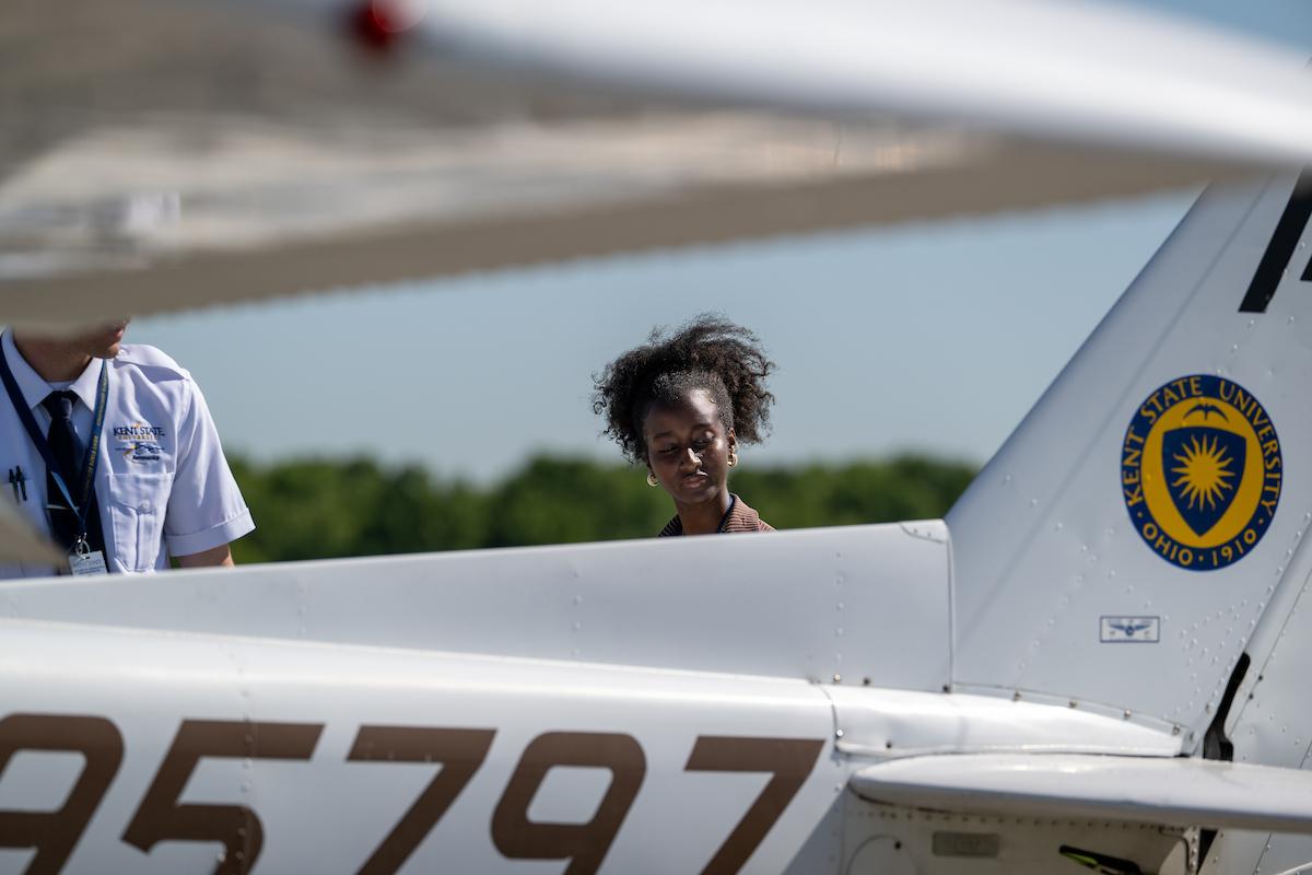 Milka Isingizwe, a �Ը������� student from Rwanda, does her preflight checks before making her first flight. (Photo credit: Bob Christy)