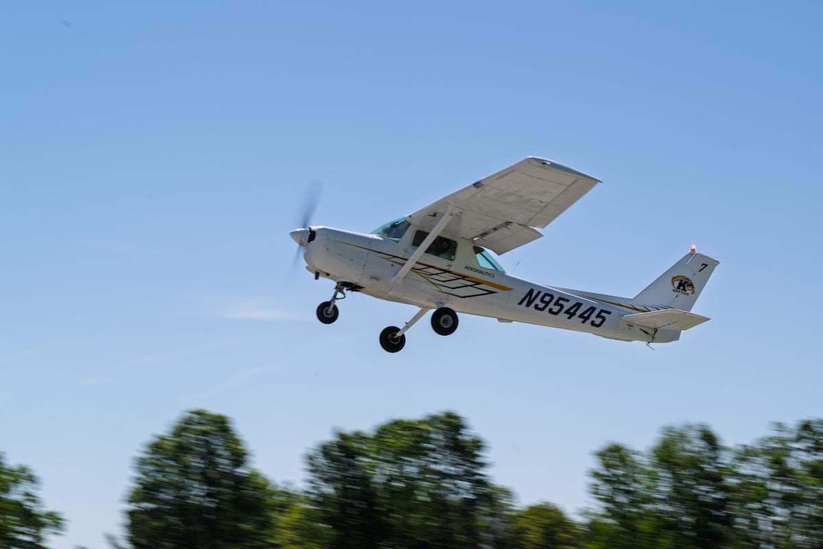 A �Ը������� student from Rwanda flies a plane for the first time at the �Ը������� University Airport. (Photo credit: Bob Christy)