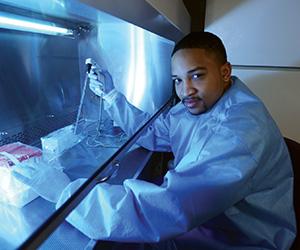 Photo of student in a lab