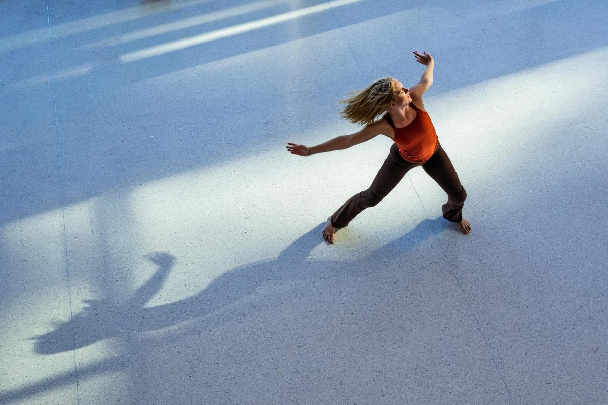 Junior dance major Macey Przybylski of Toledo, Ohio, takes part in the Pledge.