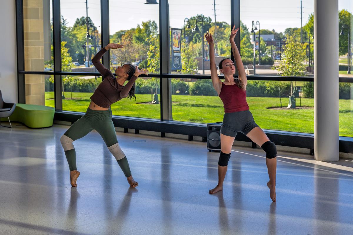 Student dancers perform the Pledge, in the Integrated Sciences Building lobby.