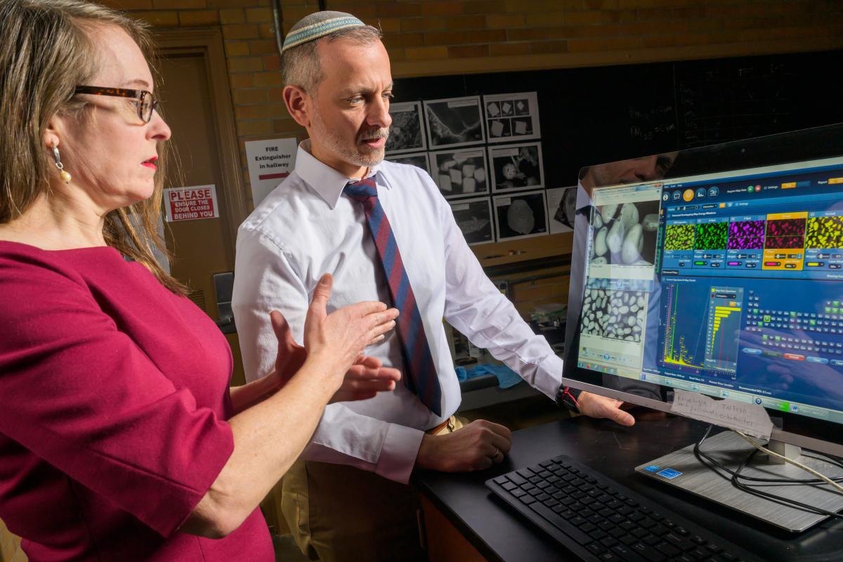 Bridget Mulvey (left) and David Singer (right) in McGilvrey Hall on the Kent Campus
