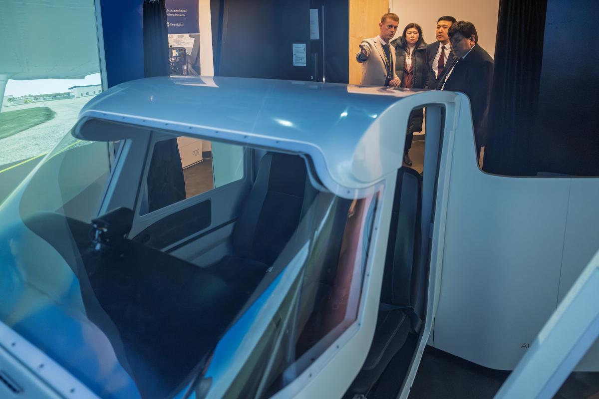 Officials from the Civil Aviation Academy in Almaty, Kazakhstan tour the 91���� Airport.