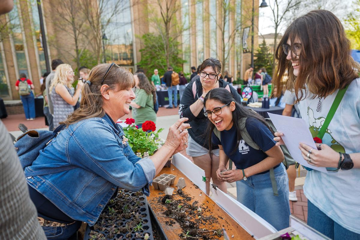 Melissa Davis of the Herrick Conservatory offered succulent plants to students.