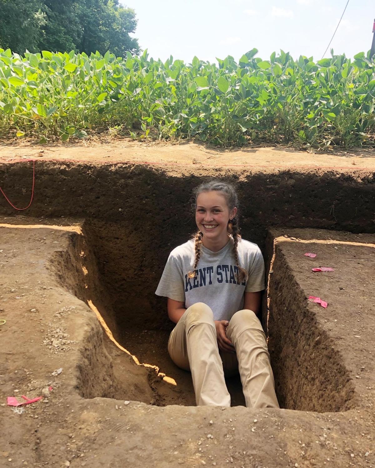 Grace Conrad at an archaeological dig site