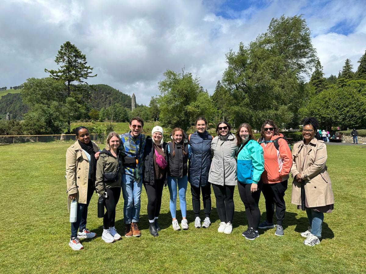 Group photo of students on a lawn.