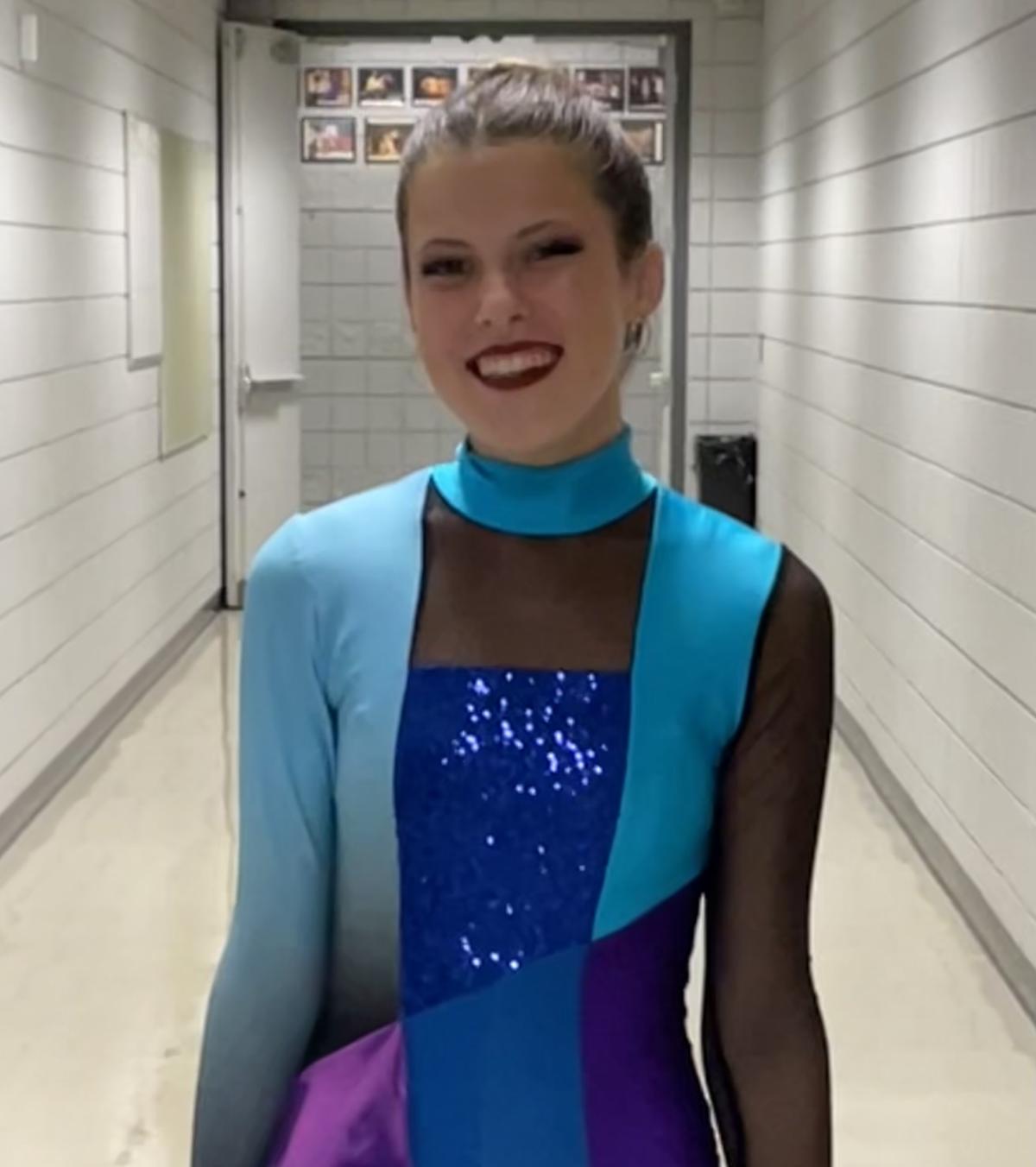 Honors College Student Annie Wendt in color guard uniform.