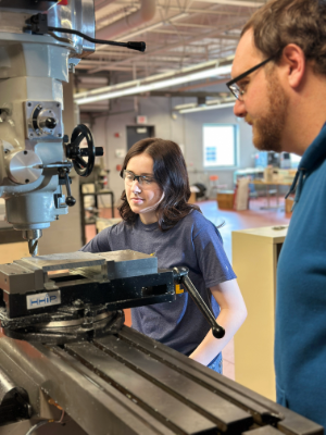 Carolynn Coonce works the drill with instructor Michael Kohuth