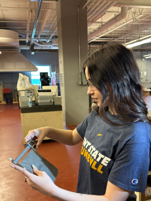 Coonce using caliper to measure the exact dimensions