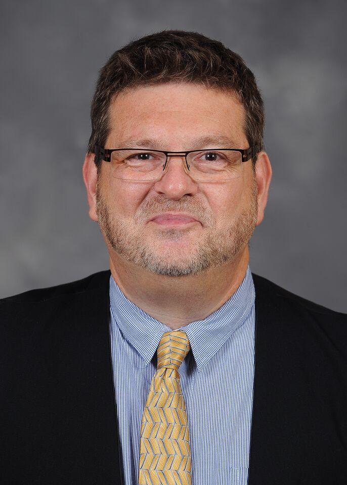 Dr. Chris Woolverton
