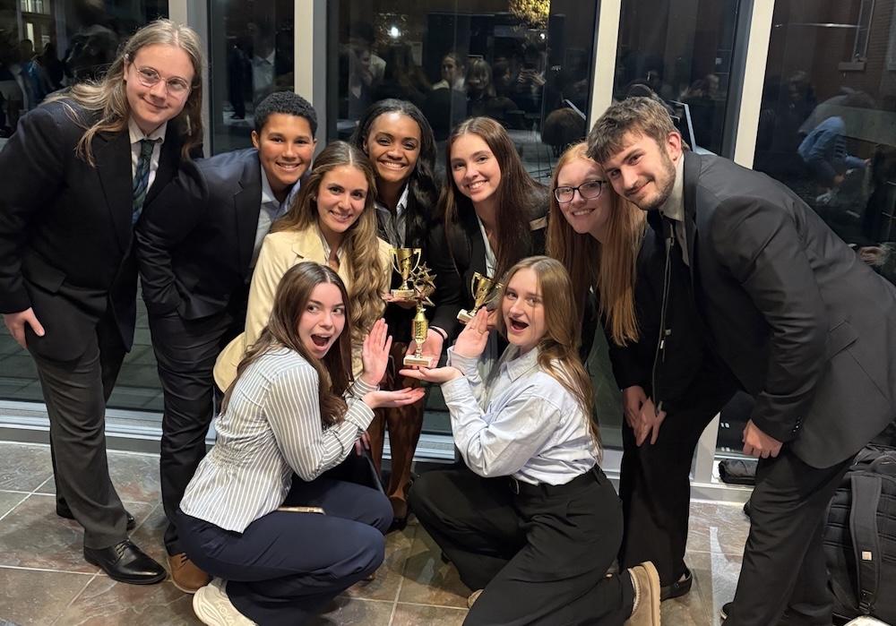 2026 Mock Trial Competition Team with trophy