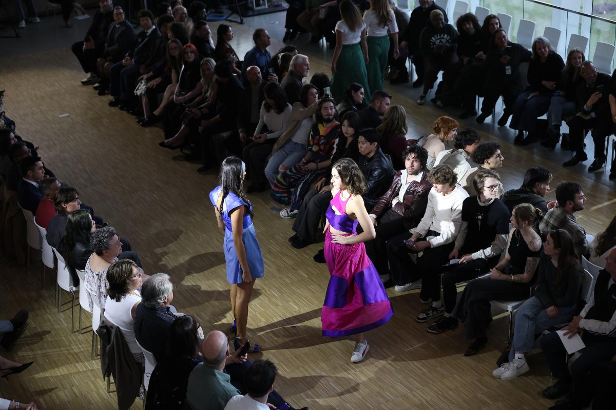 A student walks the runway at the Kent State Fashion Show Spring 2026