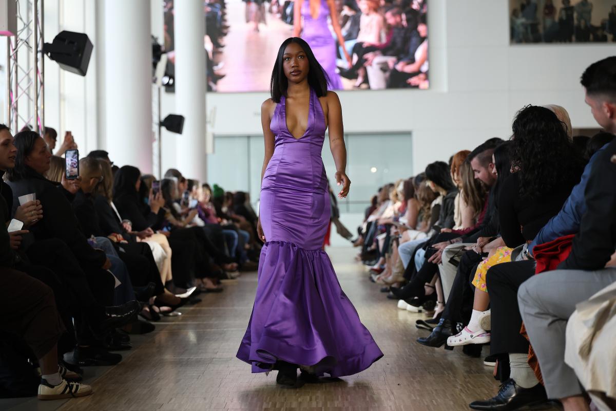 A student walks the runway at the Kent State Fashion Show Spring 2026