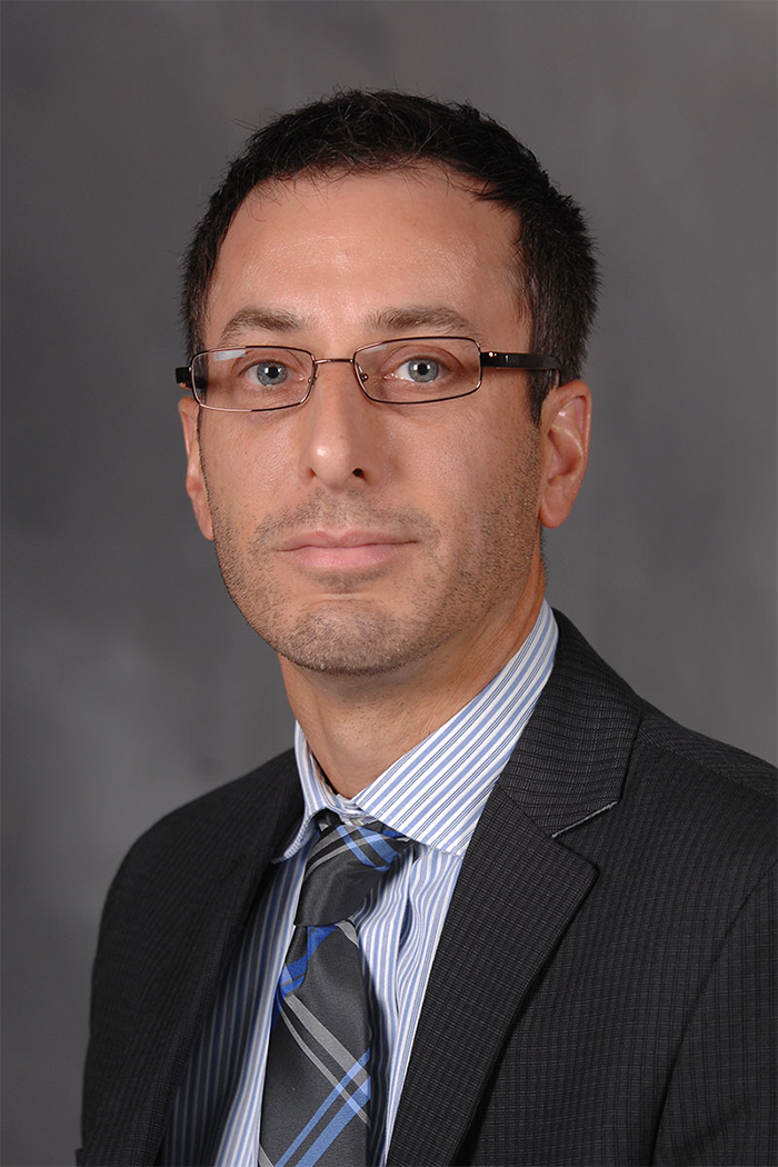Dr. Deric Kenne