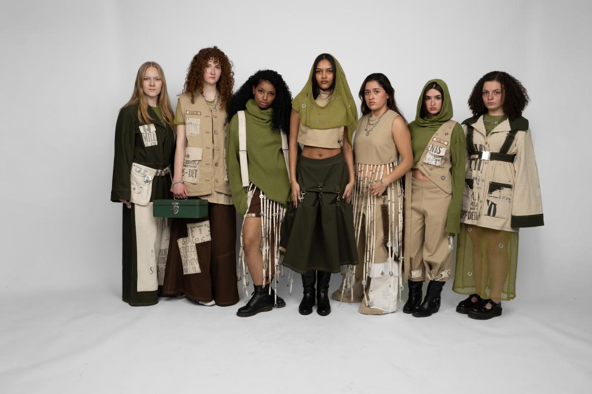 a group of models wearing a collection of steetwear in greens and khakis featuring fringe and sheer garments