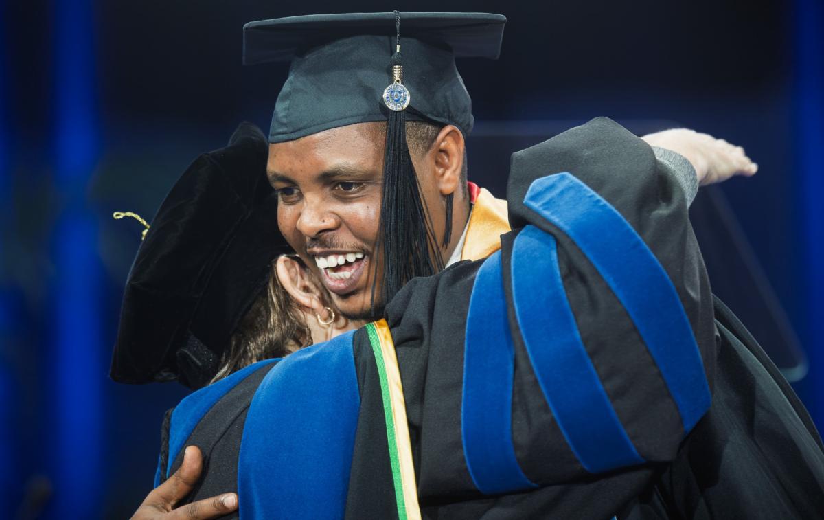 Rwandan Francis Rubagumya earned his master's degree at Kent State now he is paying it forward.