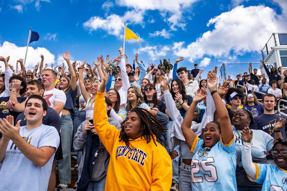 91PORNA students and alumni cheer on the Golden Flashes during the Homecoming football game in 2025. (Photo credit: Mike Rich, 91PORNA)