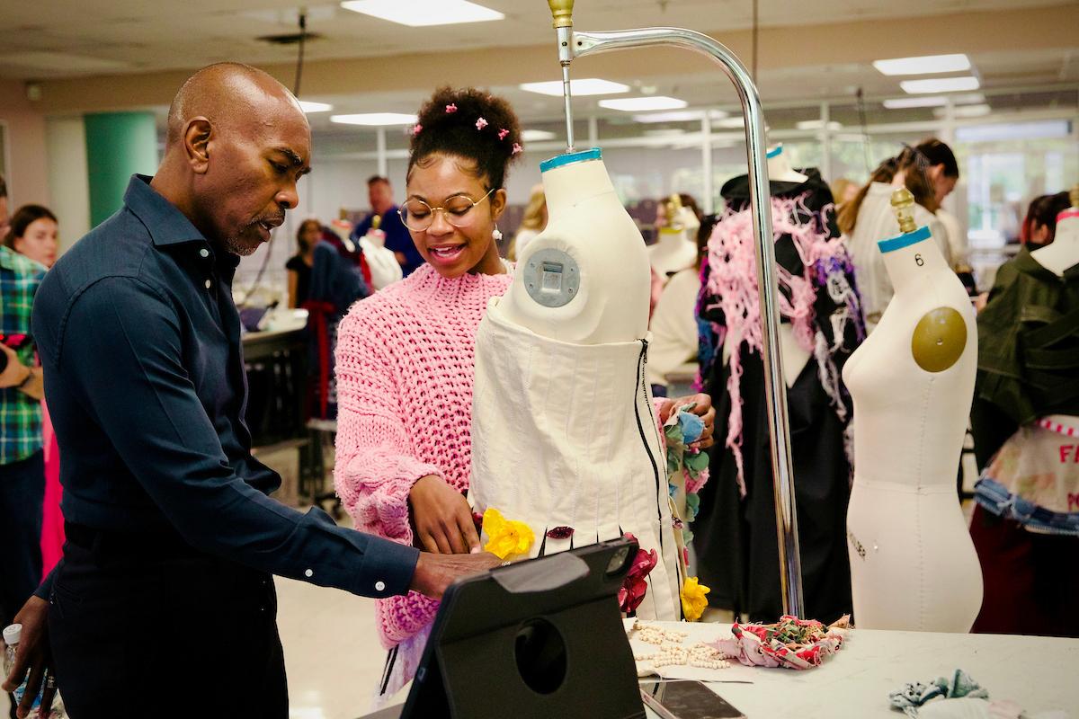 Paul Tazewell with a student from Kent State's School of Fashion.